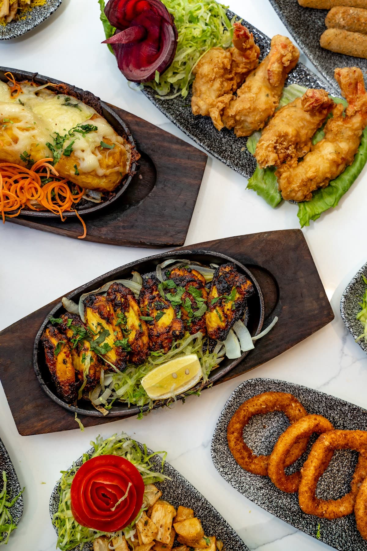 Tigerbay Shisha Lounge | Sports Bar | London | Indian Food | Bar | Desserts | Beer Garden