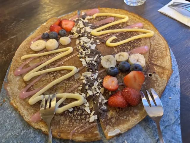 a dutch pancake with fruit at dutch pancake masters, amsterdam