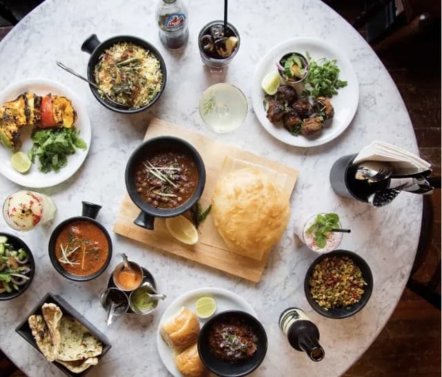 a table spread at dishoom shoreditch, london